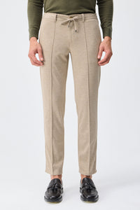 Beige zacht jersey smart casual pak voor heren: blazer en broek.