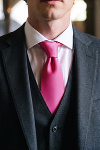 Roze, smalle stropdas voor heren, effen kleur.