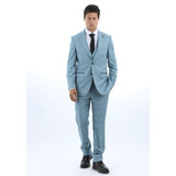 Man wearing a light blue suit with a white shirt and black tie on a white background