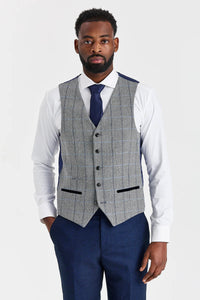 Arthur Navy pak met contrasterend Harris Grey tweed vest.