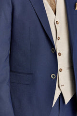 Belmont marineblauw pak met contrasterend Belmont beige vest.