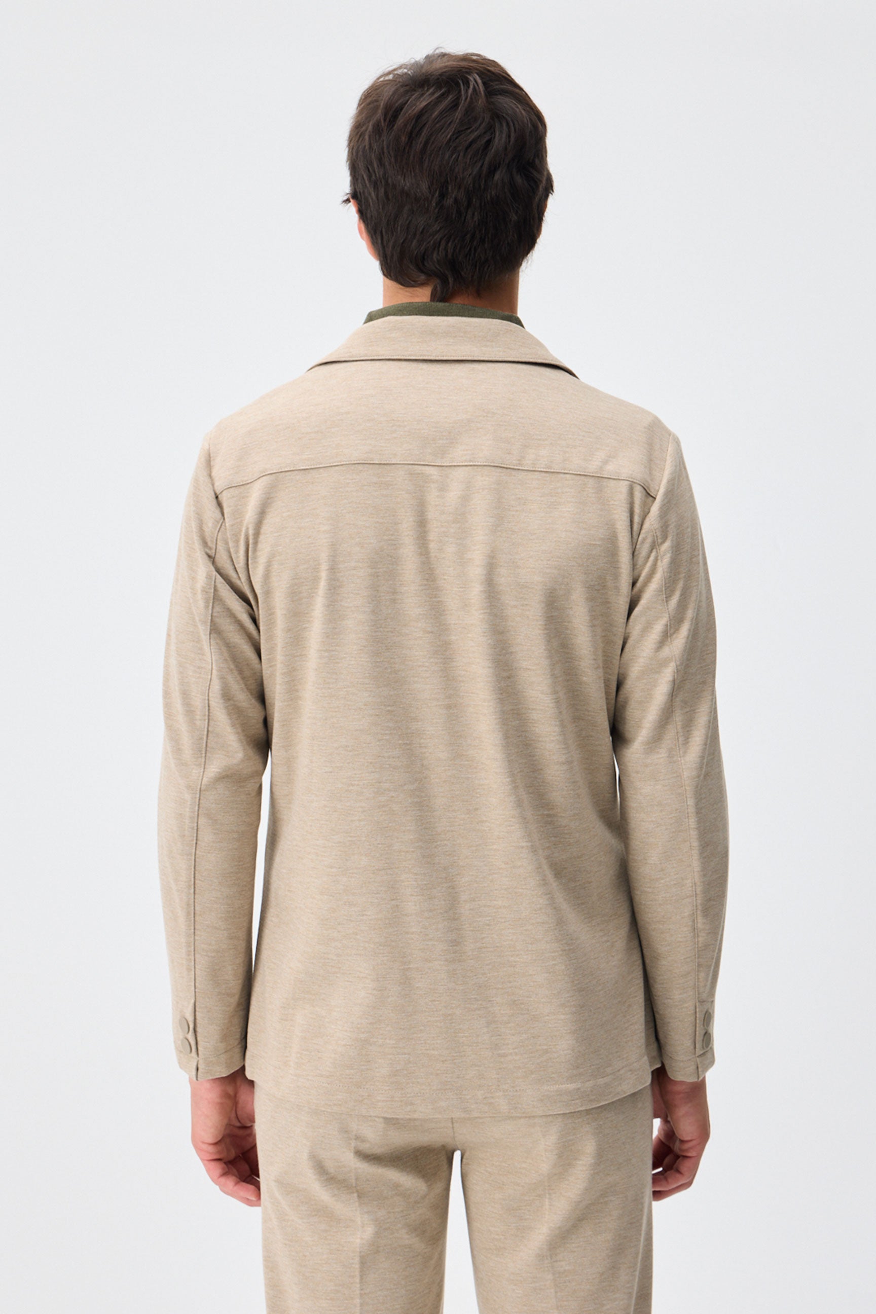 Beige zacht jersey smart casual pak voor heren: blazer en broek.