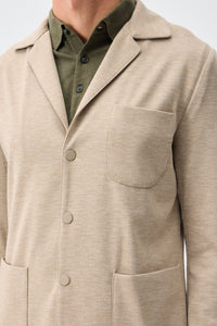 Beige zacht jersey smart casual pak voor heren: blazer en broek.
