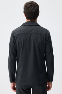 Herenpak bestaande uit een blazer en een broek van zachte, antracietkleurige jersey in smart casual stijl.