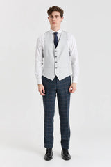 Harris marineblauwe tweedpak met contrasterend Belmont zilverkleurig vest.