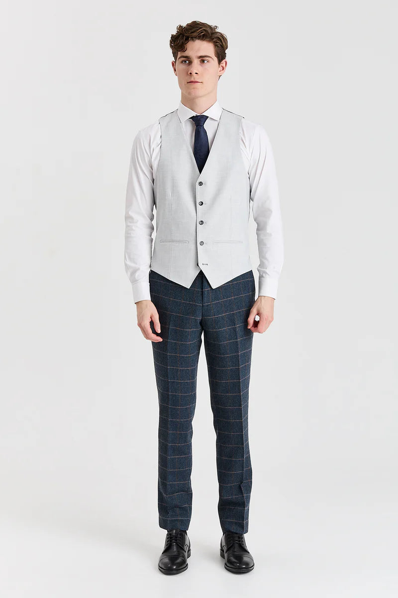 Harris marineblauwe tweedpak met contrasterend Belmont zilverkleurig vest.