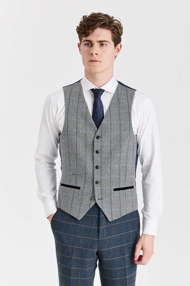 Harris marineblauwe tweedpak met Harris contrasterend grijs tweedvest.