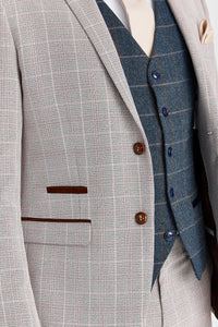 Leo beige pak met Harris marineblauwe tweed gilet