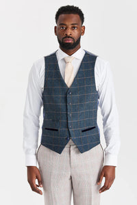 Leo beige pak met Harris marineblauwe tweed gilet