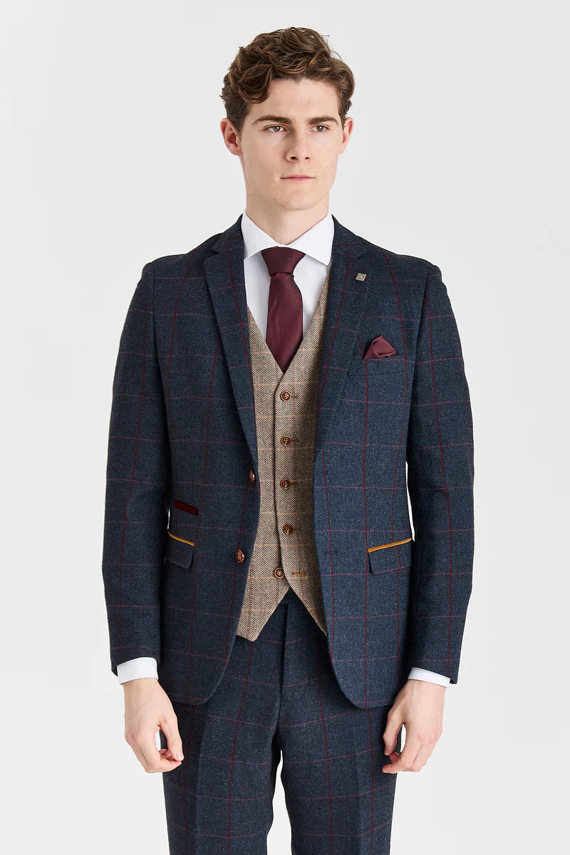 Madrid marineblauw pak met contrasterend Harris Brown tweed vest.