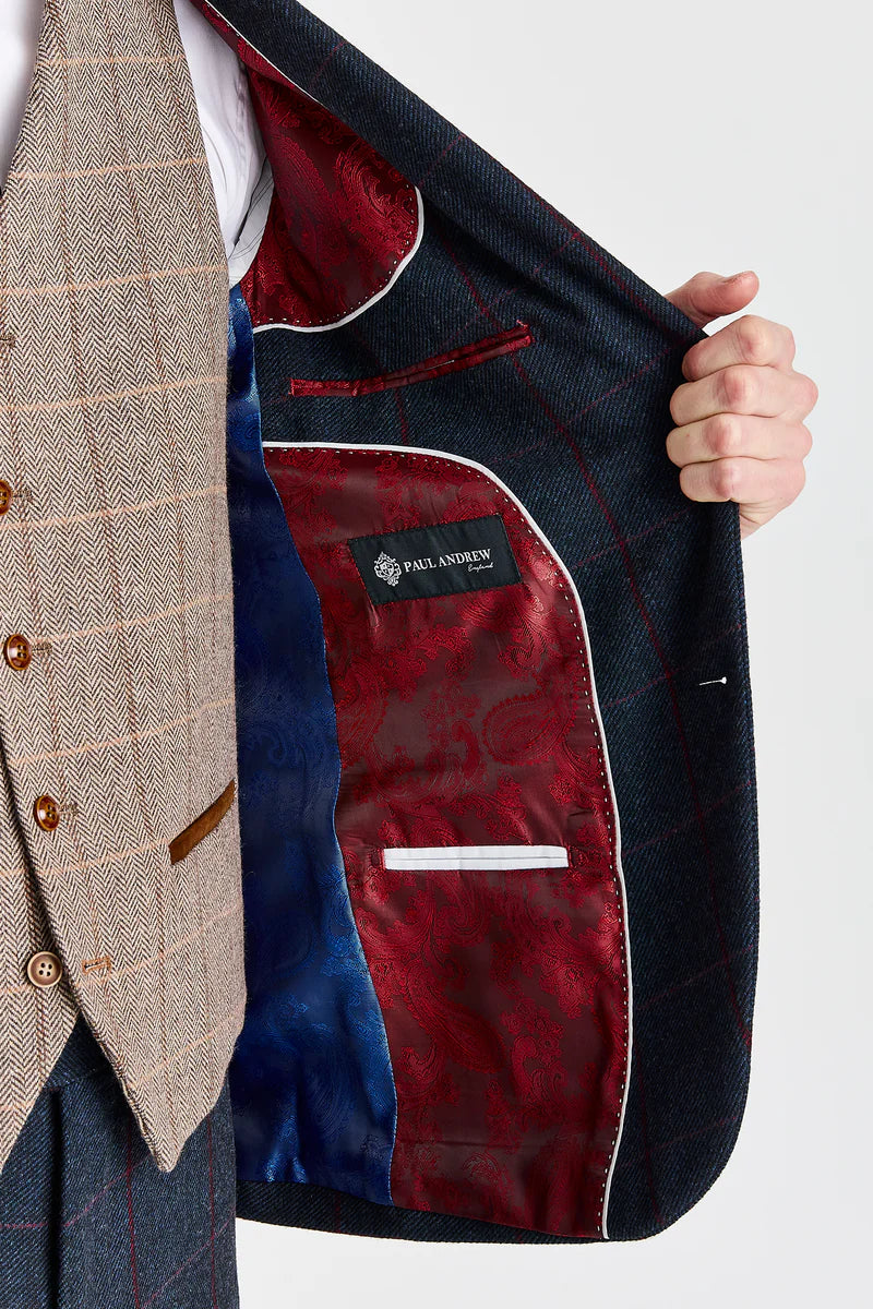 Madrid marineblauw pak met contrasterend Harris Brown tweed vest.