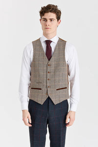 Madrid marineblauw pak met contrasterend Harris Brown tweed vest.