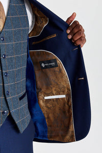 Mayfair marineblauw pak met textuur en Harris marineblauw contrasterend tweed vest.