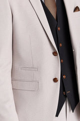 Mayfair pak met steenstructuur en contrasterend zwart vest.