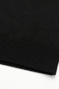 Zwarte gebreide trui met ronde hals voor heren, gemaakt van acryl.