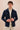 Herenset: marineblauwe linnen jas met rits en beige broek, smart casual zomeroutfit