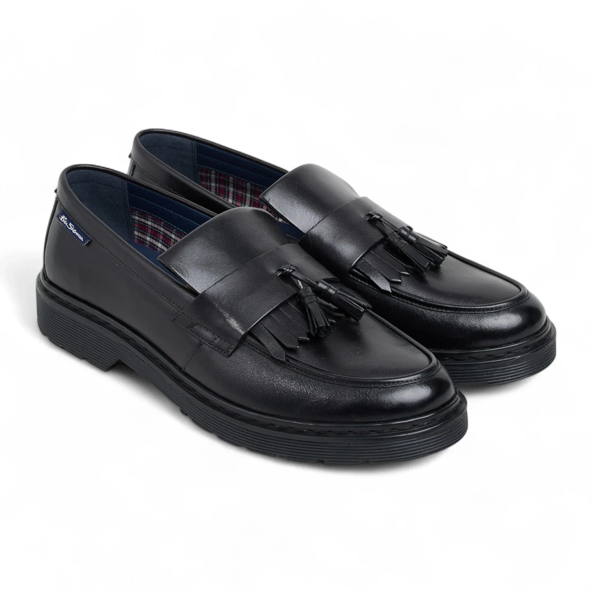 Zwarte leren loafers met dikke zool en kwastjes voor heren