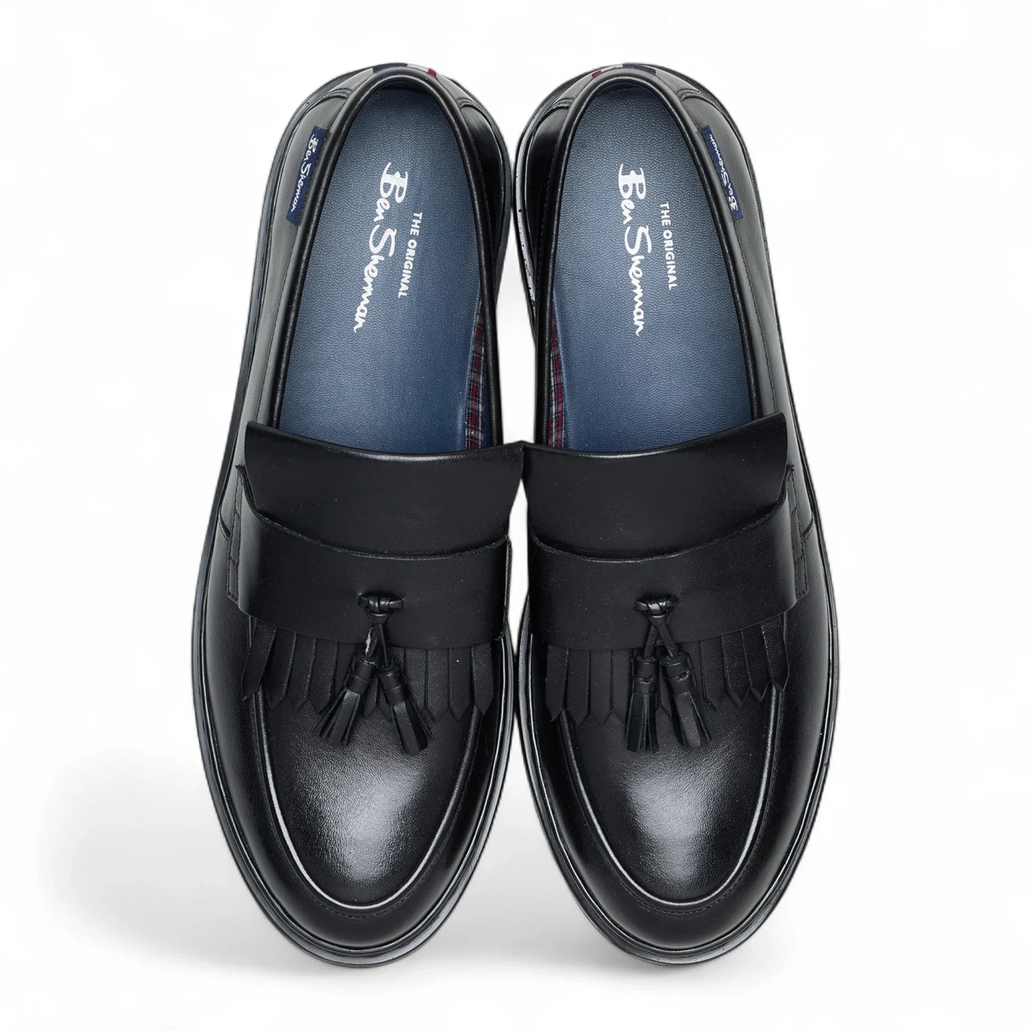 Zwarte leren loafers met dikke zool en kwastjes voor heren