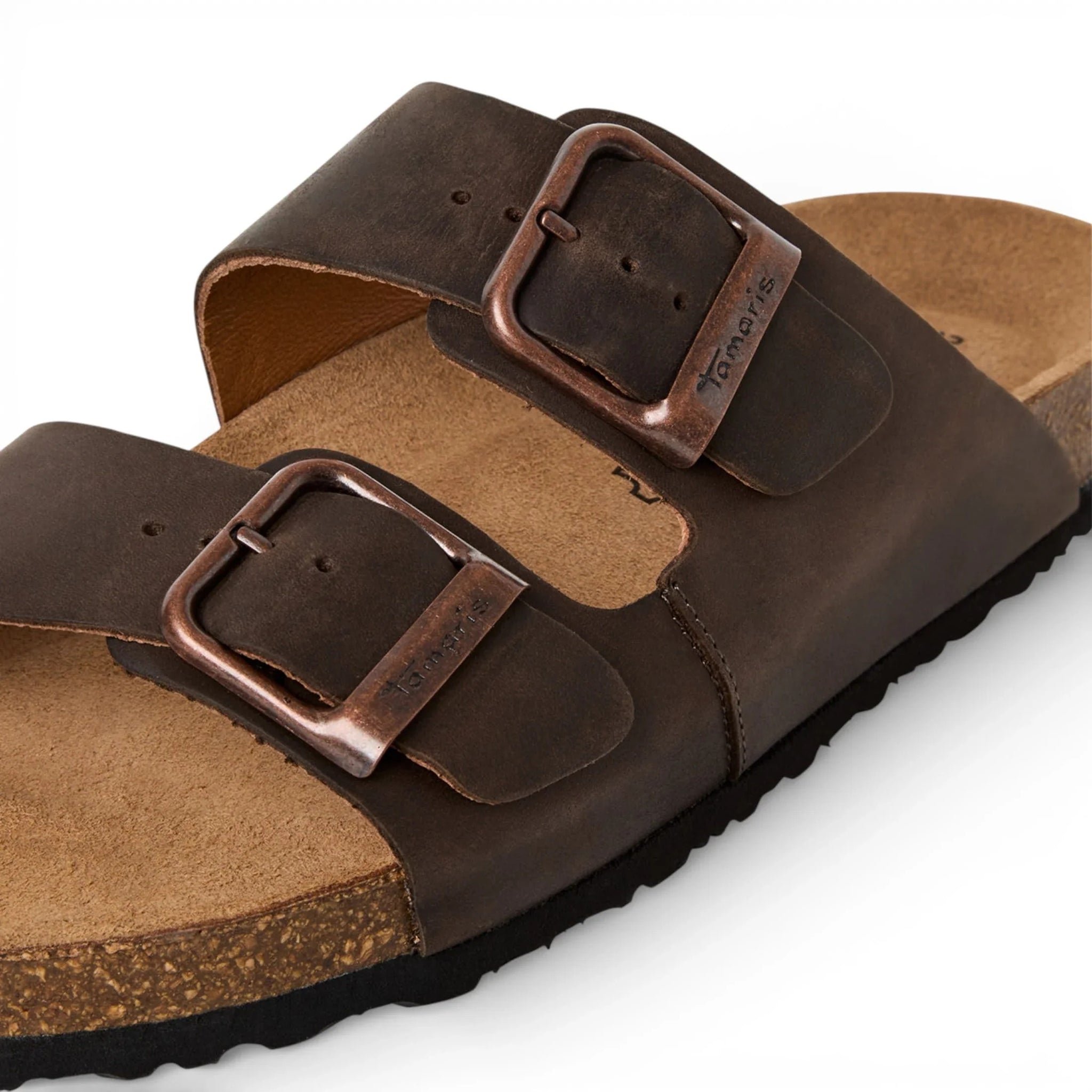Bruine leren instapslippers voor heren met voetbed.