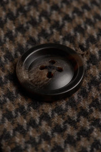 Herenjas van bruin wolmengsel met pied-de-poulemotief en tweedmotief