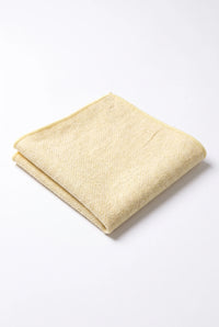 Champagnekleurige tweed pochet voor heren, gemaakt van een wolmix.