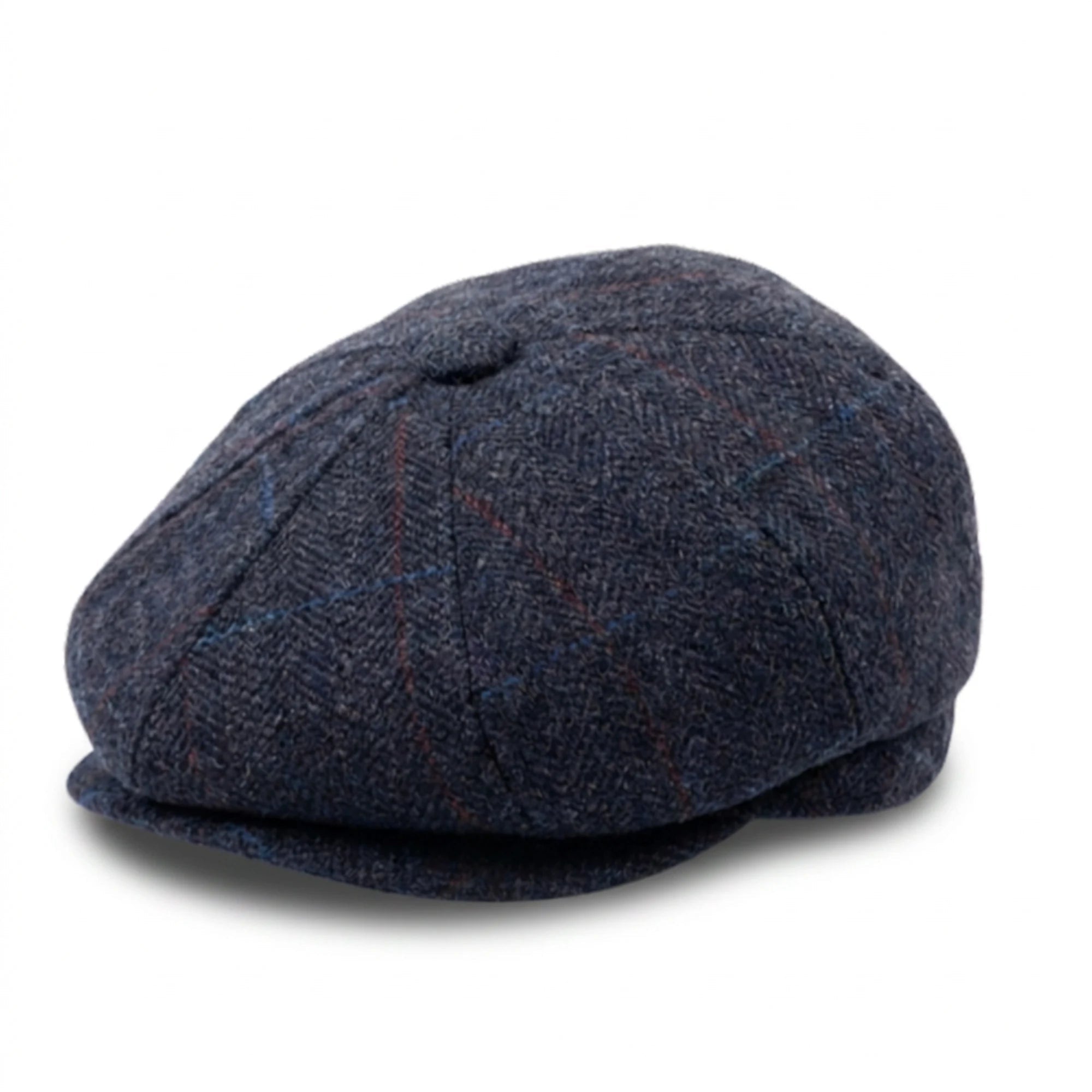 Herenpet in marineblauwe wollen tweedstof, model newsboy.