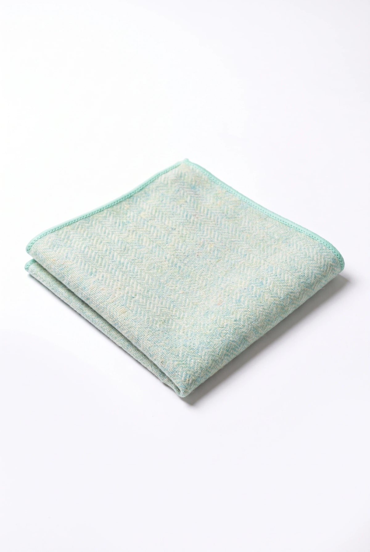 Herenpochet van saliegroene tweedwolmix