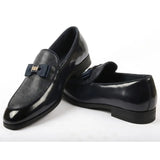 Heren loafers met textuur aan de voorkant en iconische gesp en strik