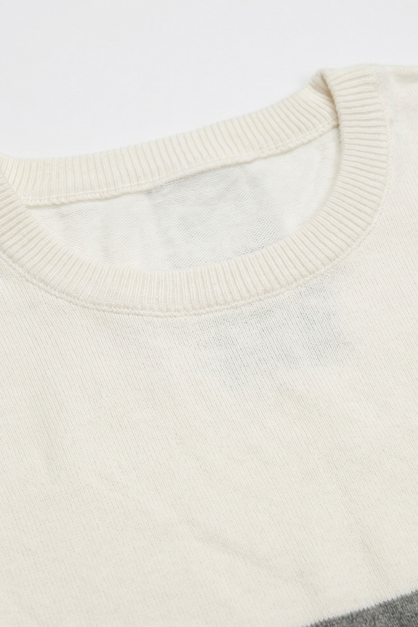 Wit en zwart gebreid T-shirt met kleurblokken voor heren